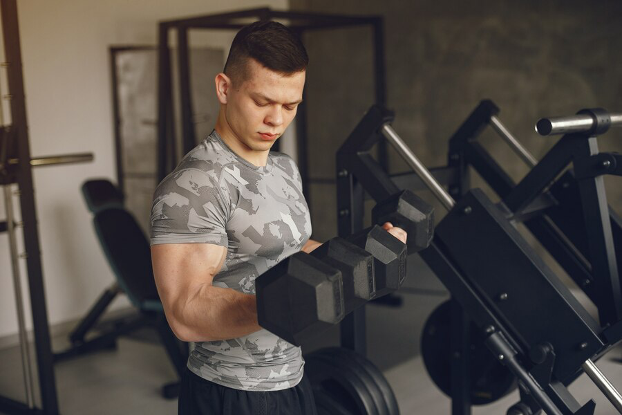 exercising biceps with dumbell